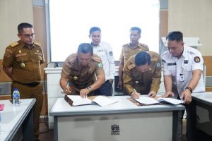 Pemkab dan KPU Bombana Laksanakan Penandatanganan Naskah Perjanjian Hibah Daerah